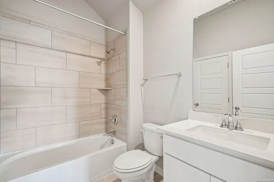 Furnished interior view inside a new home in Estancia Ranch - Classic Series, San Antonio (Image 10).