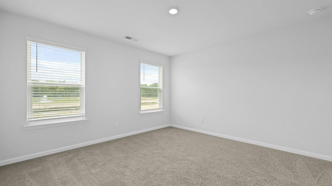 Spacious, unfurnished interior of a new home in Pine Hills Townhomes at Cane Bay, Summerville (Image 20).