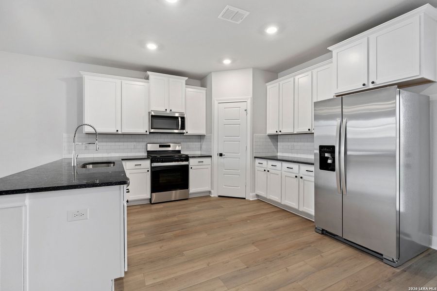 Furnished interior view inside a new home in Hightop Ridge, Converse (Image 5). Furnished interior view inside a new home in Hightop Ridge, Converse (Image 5).