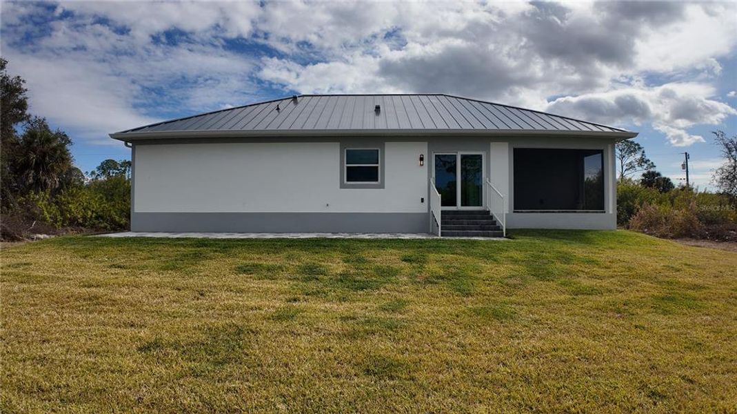 Exterior details and patio area of a home in , Port Charlotte (Image 31).