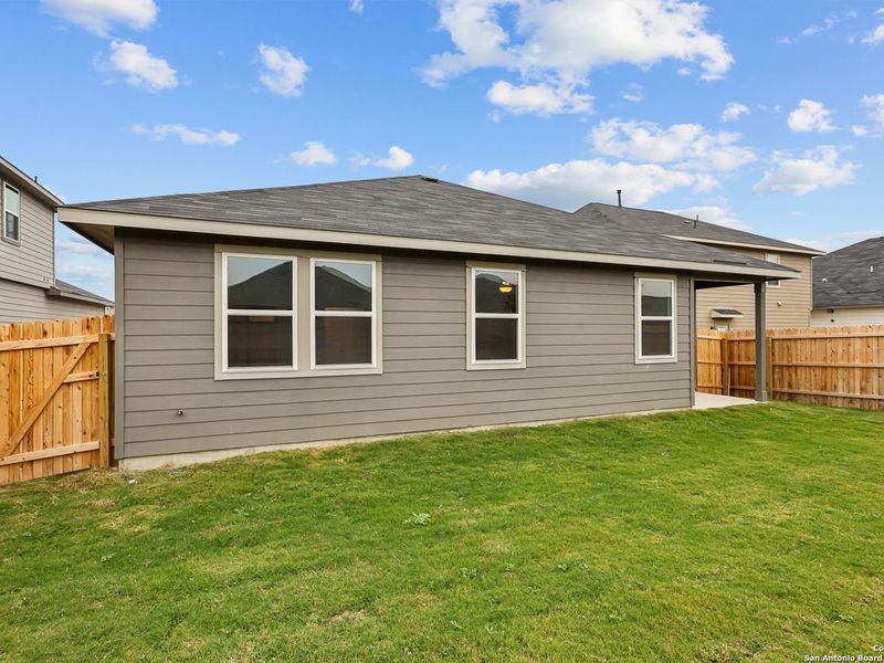 Exterior details and patio area of a home in Horizon Pointe, San Antonio (Image 4). Exterior details and patio area of a home in Horizon Pointe, San Antonio (Image 4).