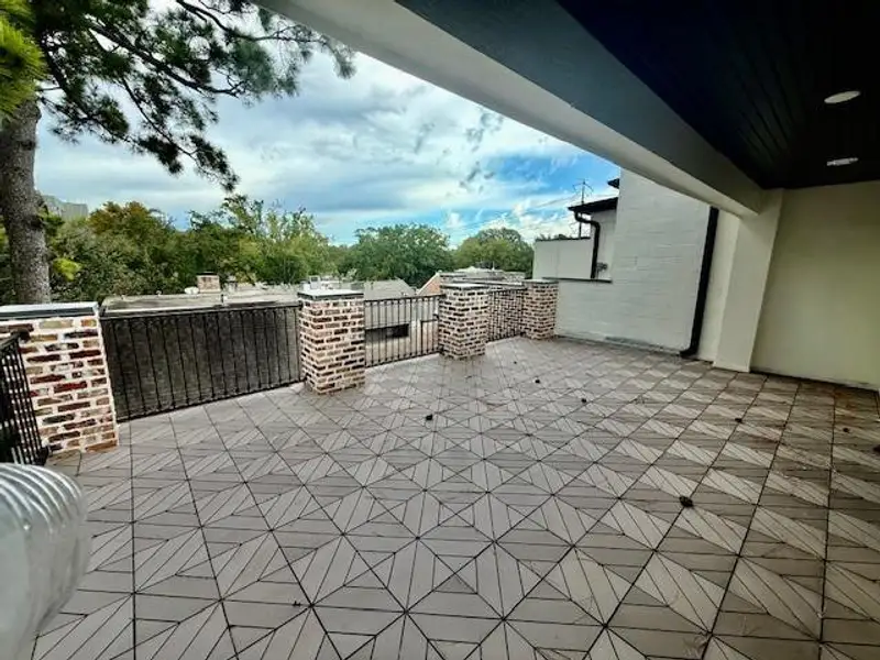 Exterior details and patio area of a home in Raintree, Houston (Image 4). Exterior details and patio area of a home in Raintree, Houston (Image 4).