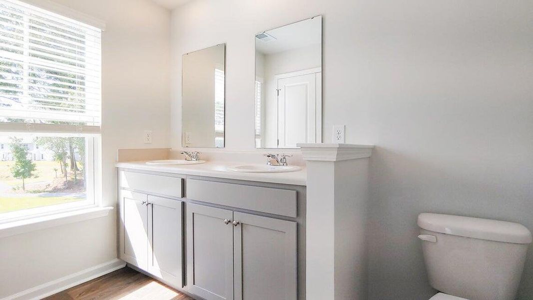 Furnished interior view inside a new home in Garbon Fields, Summerville (Image 13).