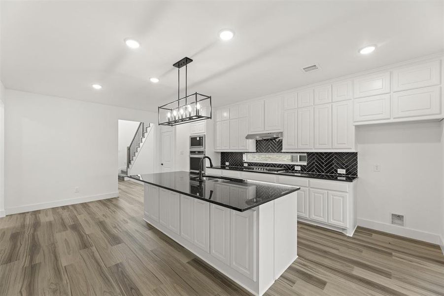 Furnished interior view inside a new home in The Villages of Hurricane Creek, Anna (Image 12). Furnished interior view inside a new home in The Villages of Hurricane Creek, Anna (Image 12).