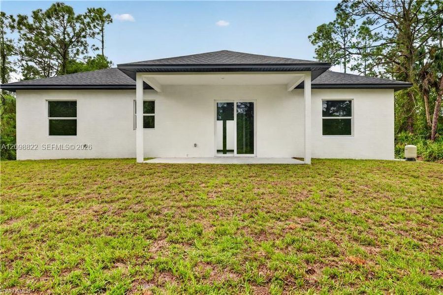 Exterior details and patio area of a home in , Lehigh Acres (Image 14).