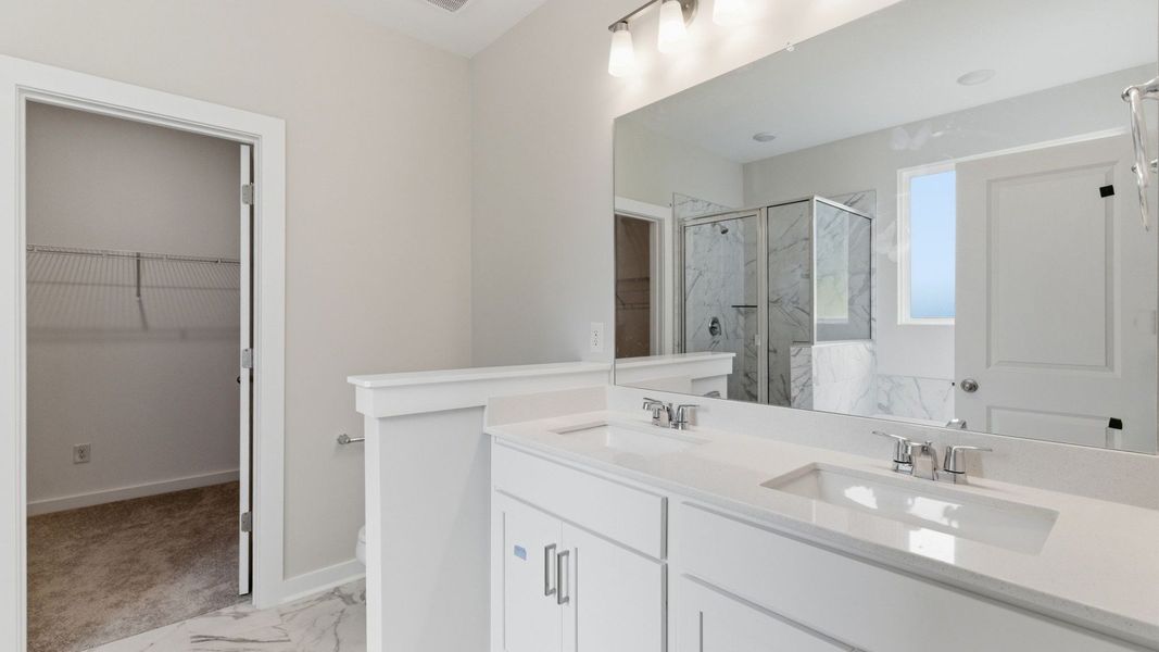 Primary bathroom with dual vanity Primary bathroom with dual vanity