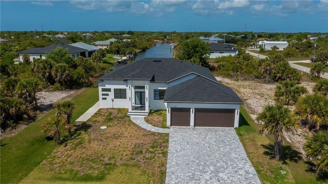 Front exterior of a new home in , Port Charlotte, FL, highlighting curb appeal (Image 28).