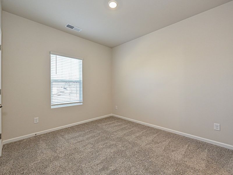 Turn a secondary bedroom into a relaxing guest space.