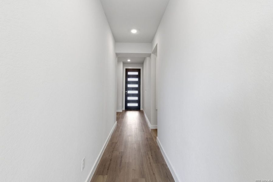 Spacious, unfurnished interior of a new home in The Meadows at Hunters Ranch, San Antonio (Image 26).