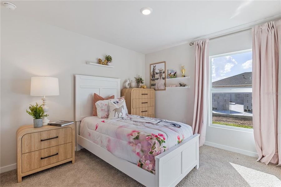 Furnished interior view inside a new home in Central Parc, North Port (Image 11).