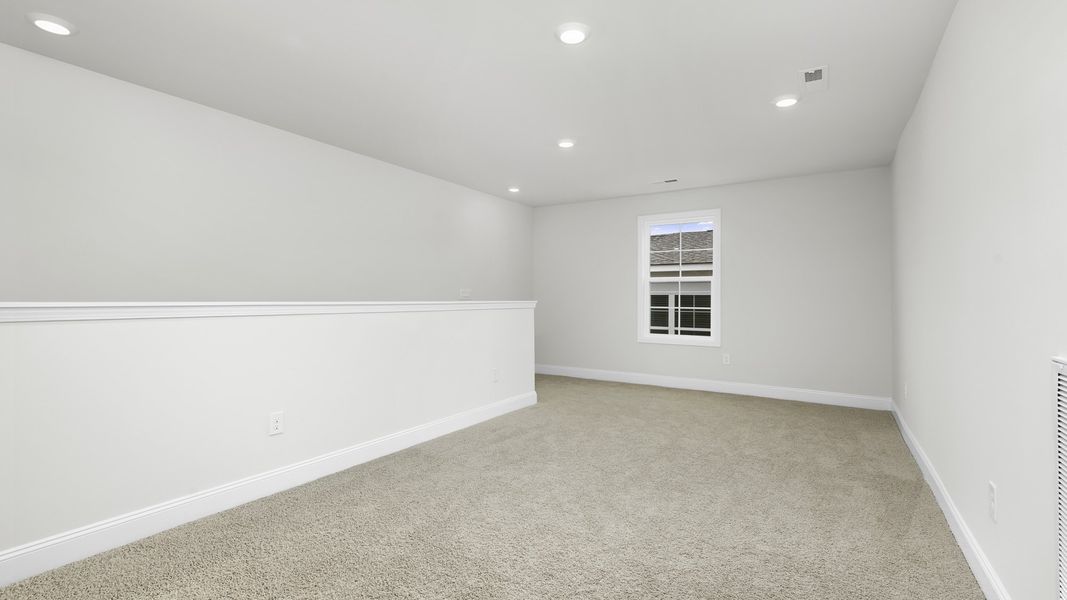 Spacious, unfurnished interior of a new home in The Villas at Kinsley, Jamestown (Image 17).