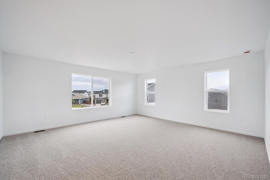 Spacious, unfurnished interior of a new home in Fossil Creek, Windsor (Image 20).
