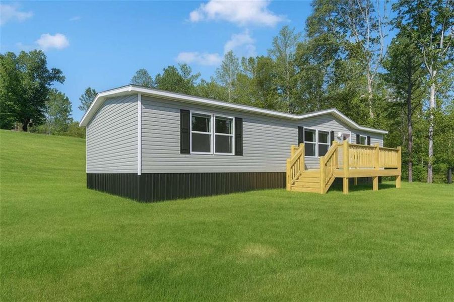 Exterior details and patio area of a home in , Ellijay (Image 27).