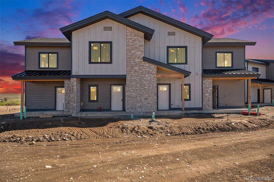 Front exterior of a new home in , Granby, CO, highlighting curb appeal (Image 4).