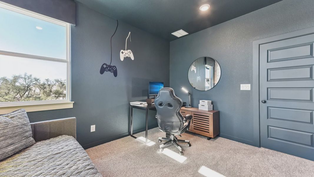 Representative furnished interior of a home built from the Peyton by Chesmar Homes in The Grove at Blackhawk, Pflugerville (Image 45).