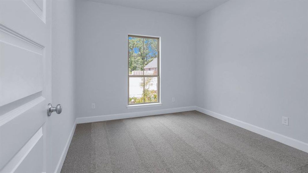 Spacious, unfurnished interior of a new home in Artavia 45', Conroe (Image 8).