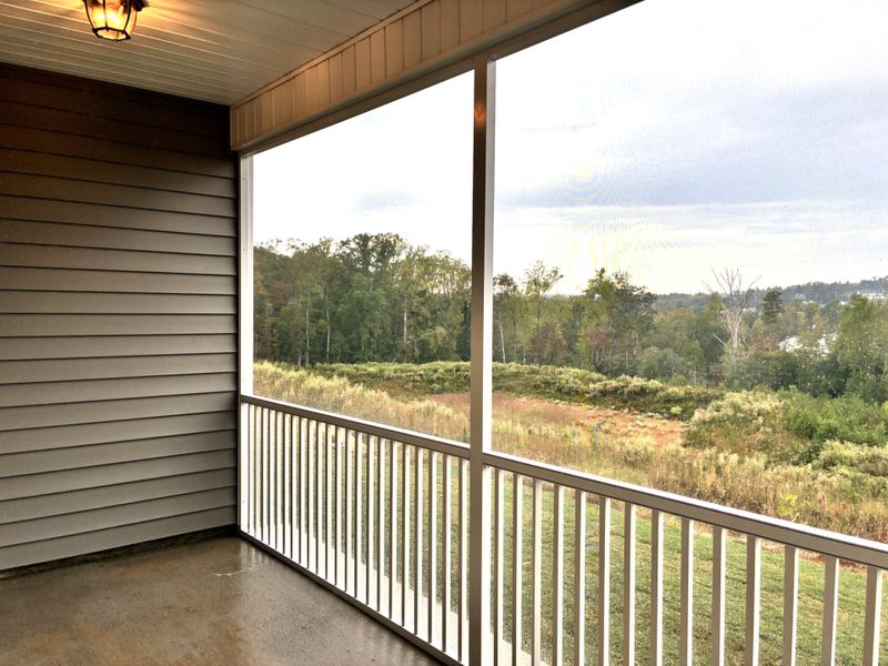 Exterior details and patio area of a home in Holly Ridge, Greenville (Image 2).