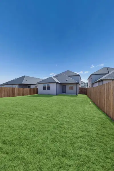 Covered Patio in the Oak II home plan by Trophy Signature Homes – REPRESENTATIVE PHOTO Covered Patio in the Oak II home plan by Trophy Signature Homes – REPRESENTATIVE PHOTO