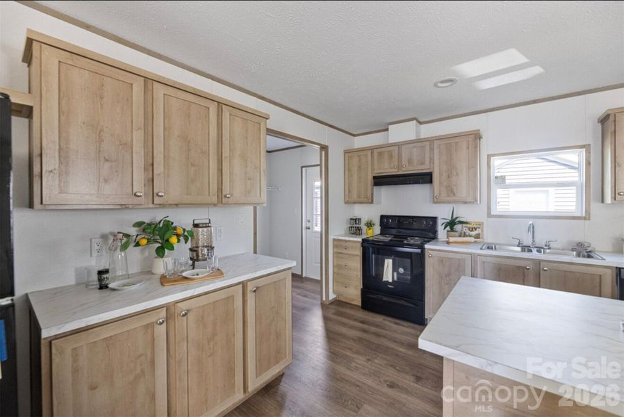 Furnished interior view inside a new home in , Hays (Image 5).