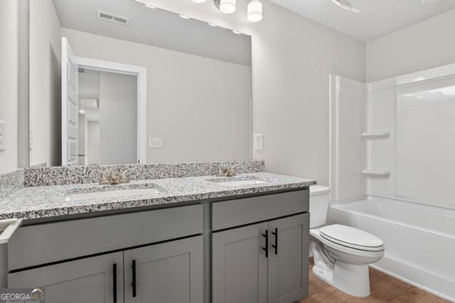 Furnished interior view inside a new home in Killian Manor at The Adares, Adairsville (Image 11).