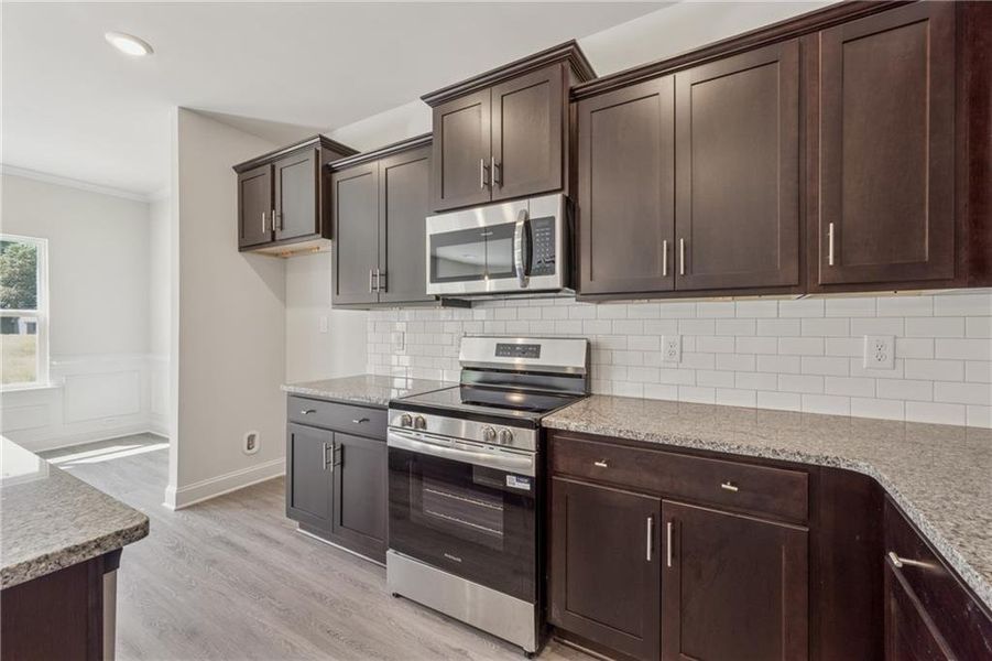 Furnished interior view inside a new home in Park Place, Bowdon (Image 3).