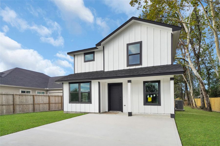 Front exterior of a new home in , Houston, TX, highlighting curb appeal (Image 1).