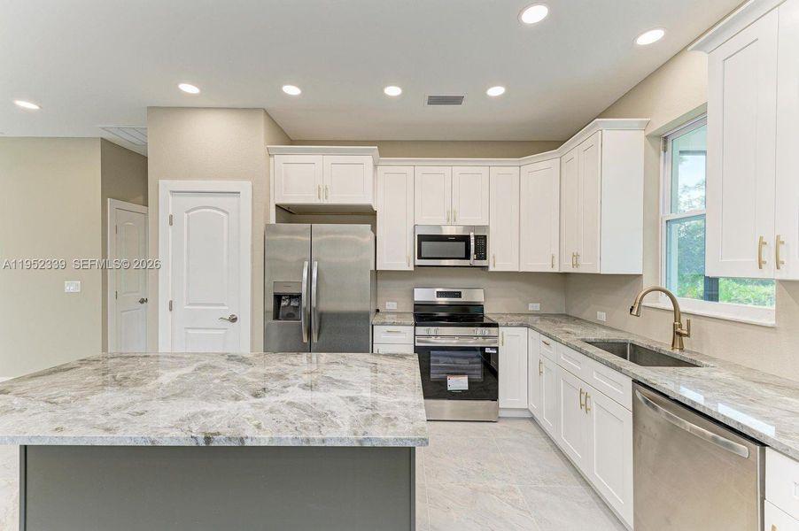 Furnished interior view inside a new home in , North Port (Image 17).