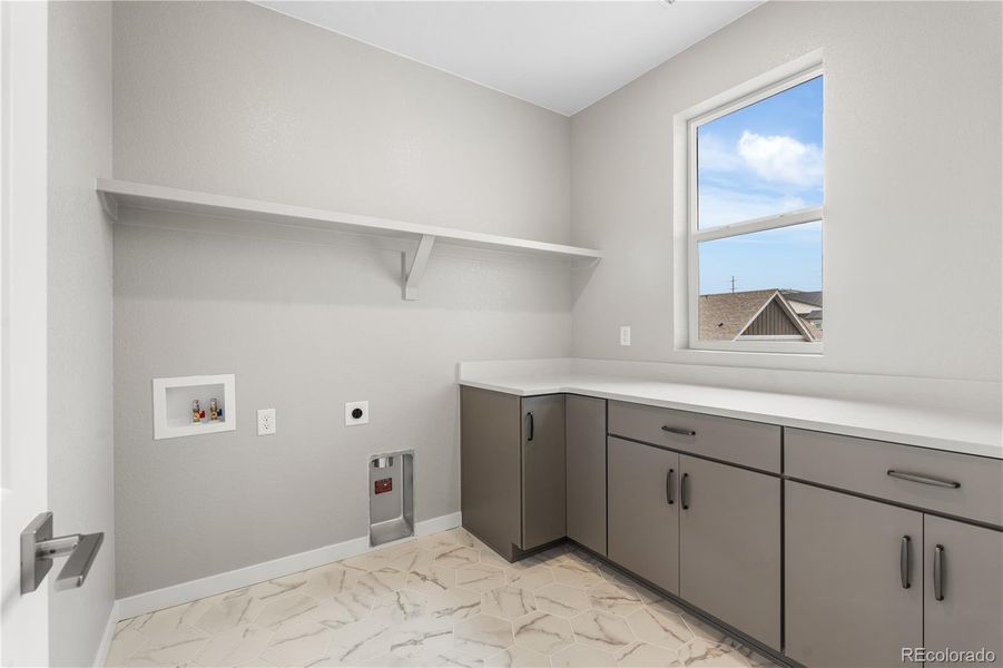 Furnished interior view inside a new home in Tribute at Lyric, Lone Tree (Image 6).