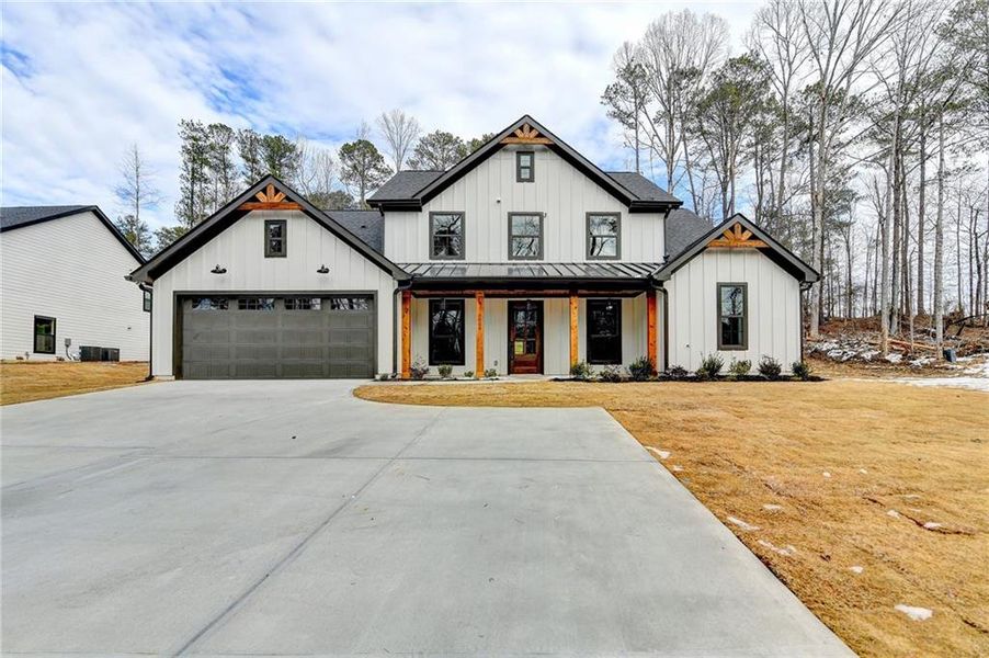 Front exterior of a new home in , Snellville, GA, highlighting curb appeal (Image 2). Front exterior of a new home in , Snellville, GA, highlighting curb appeal (Image 2).