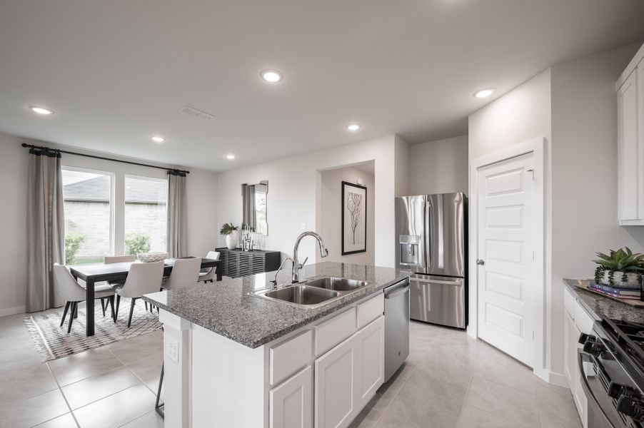 Representative furnished interior of a home built from the Caddo by Tri Pointe Homes in Mason Woods, Cypress (Image 52).