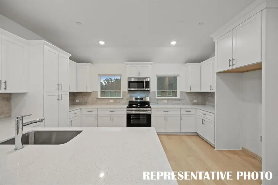 Our Elizabeth floor plan offers the dream kitchen you have been searching for!  REPRESENTATIVE PHOTO