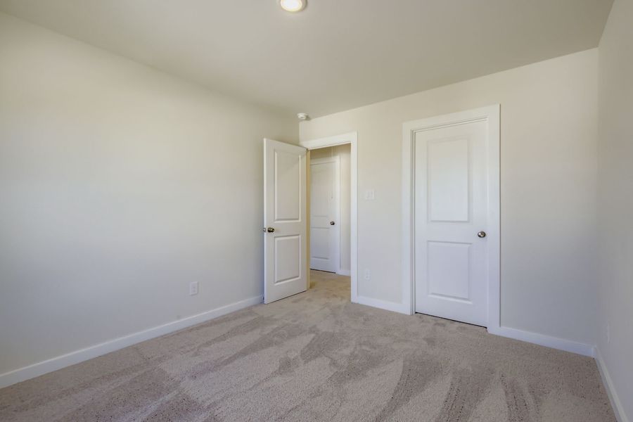 A room with white doors.