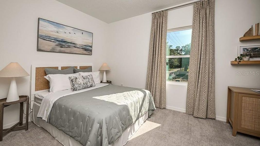 Furnished interior view inside a new home in Westview Community Group Page, Kissimmee (Image 11).