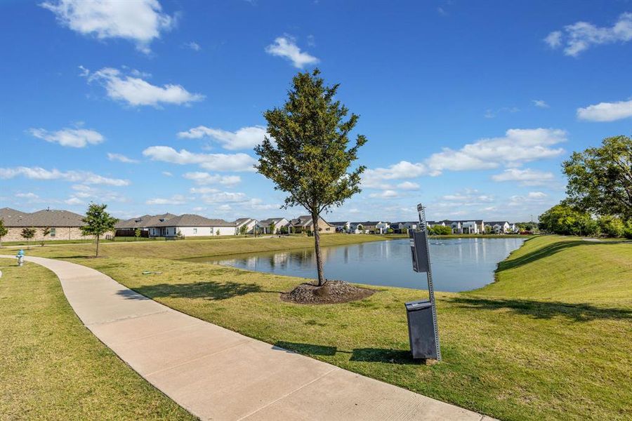 Water view featuring nearby suburban area