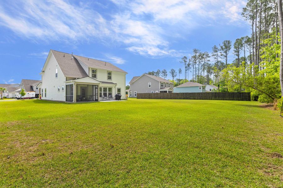 Exterior details and patio area of a home in , Johns Island (Image 27).