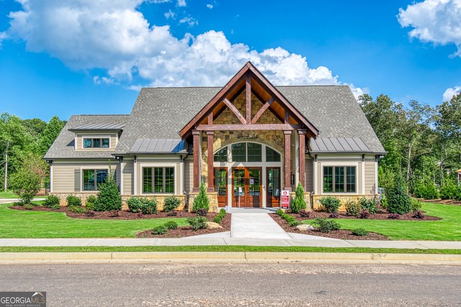 Front exterior of a new home in The Towns at Auburn Station West, Auburn, GA, highlighting curb appeal (Image 2).