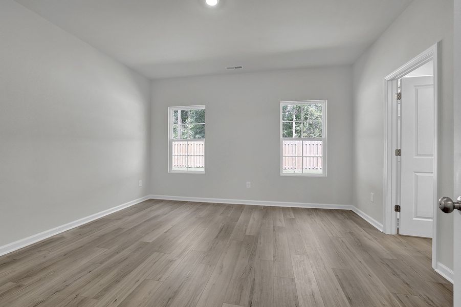 Spacious, unfurnished interior of a new home in River Tide Farms, Bolivia (Image 13).