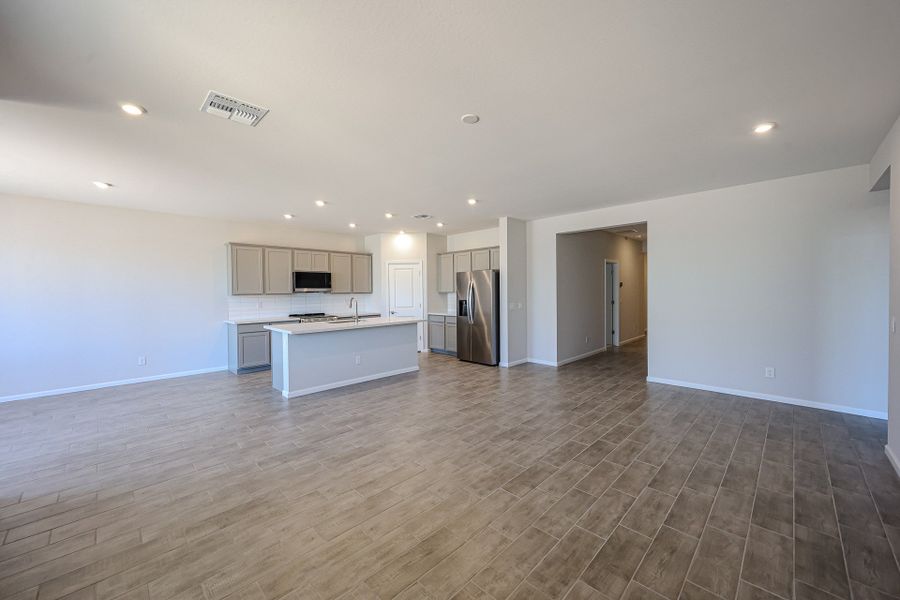 A large empty kitchen. A large empty kitchen.
