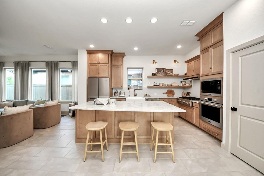 Discover your new kitchen, with abundant cabinet space and ample prep areas.