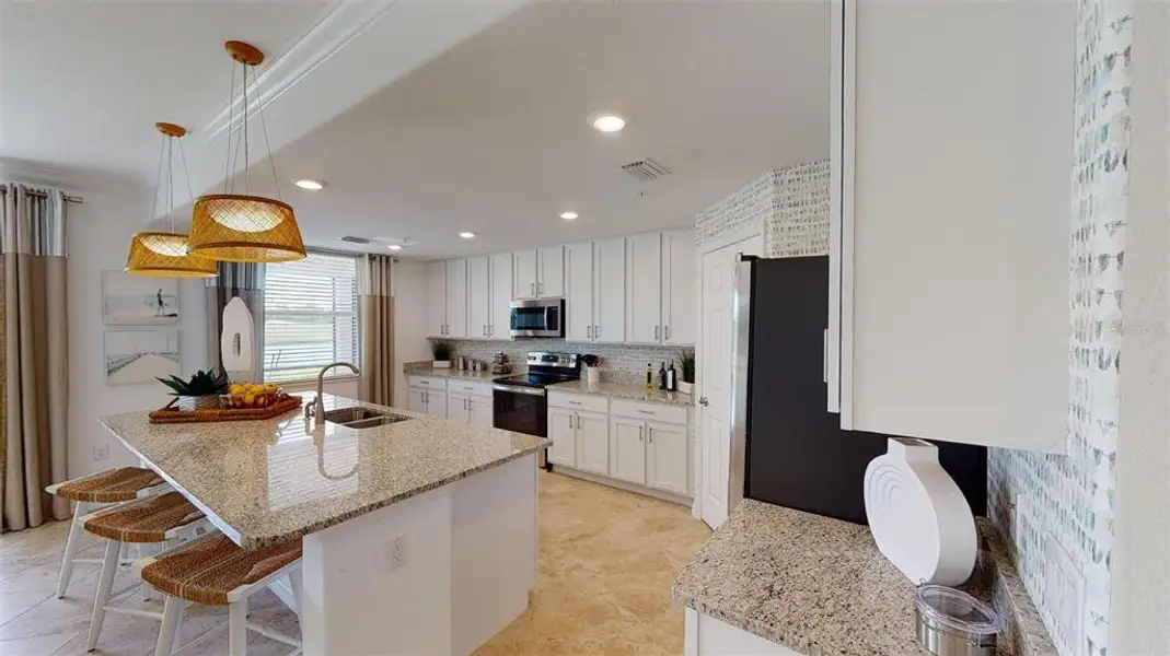 Furnished interior view inside a new home in Wellen Park Golf & Country Club, Venice (Image 9).