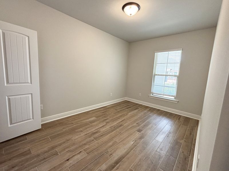Spacious, unfurnished interior of a new home in Bird Song at Hammock Bay, Freeport (Image 27).