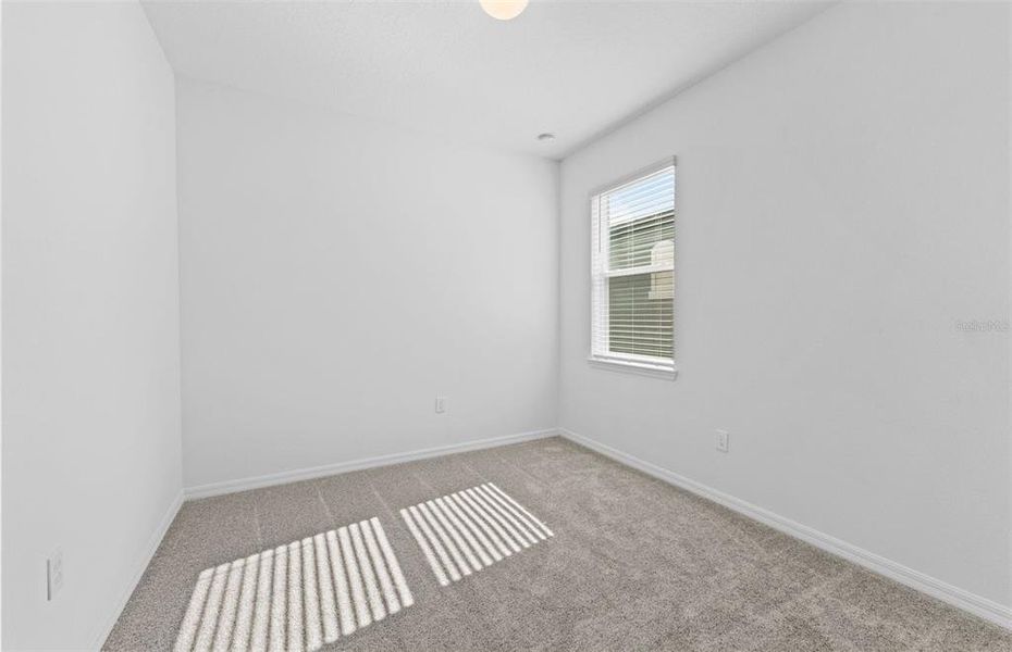 Spacious, unfurnished interior of a new home in Silverlake, Lake Alfred (Image 13).
