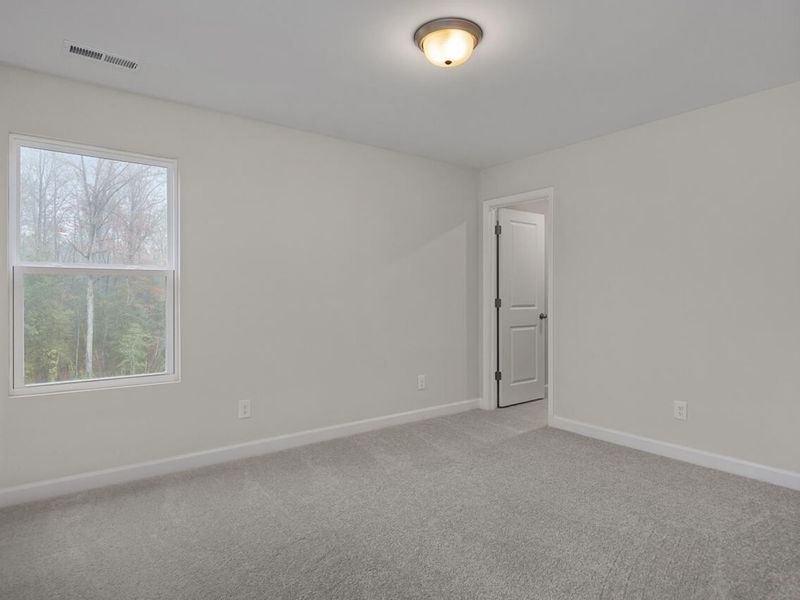 Spacious, unfurnished interior of a new home in Wellers Knoll, Lillington (Image 25).