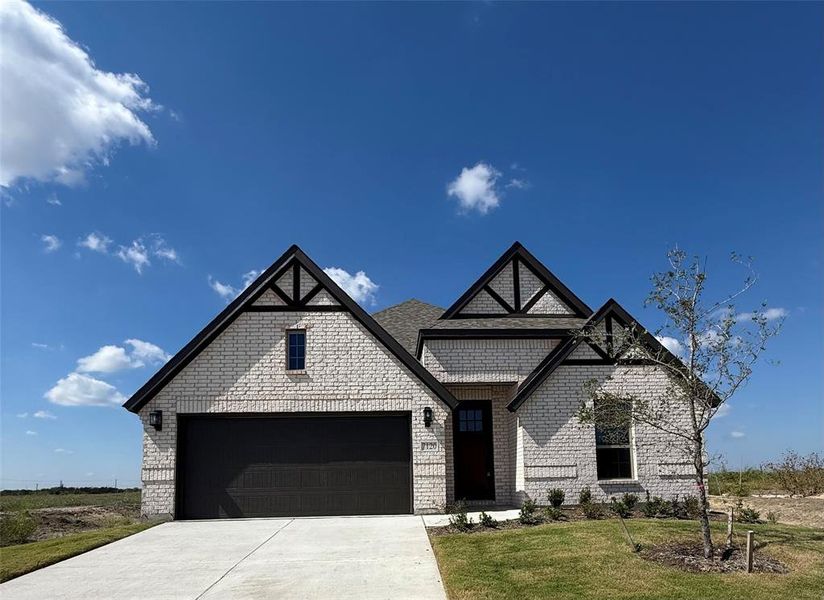 Front exterior of a new home in Mercer Meadows, Royse City, TX, highlighting curb appeal (Image 1).