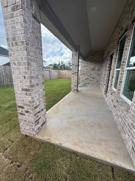Exterior details and patio area of a home in Barton Creek Ranch, Conroe (Image 2). Exterior details and patio area of a home in Barton Creek Ranch, Conroe (Image 2).
