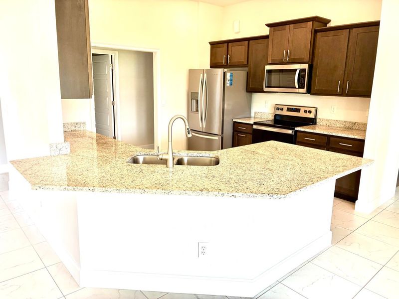 Furnished interior view inside a new home in Waterstone 72, Fort Pierce (Image 6).
