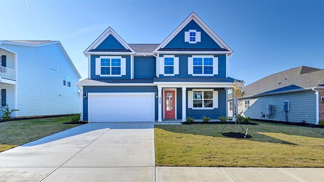 Front exterior of a new home in Livingston Woods, Irmo, SC, highlighting curb appeal (Image 2). Front exterior of a new home in Livingston Woods, Irmo, SC, highlighting curb appeal (Image 2).