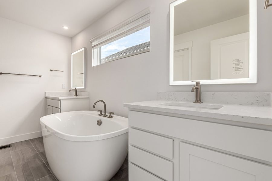 Furnished interior view inside a new home in Ascent at Inverness, Englewood (Image 4).