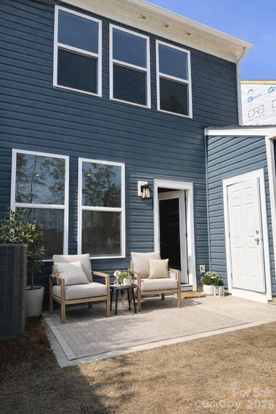 Rear Exterior with Patio and Storage Shed