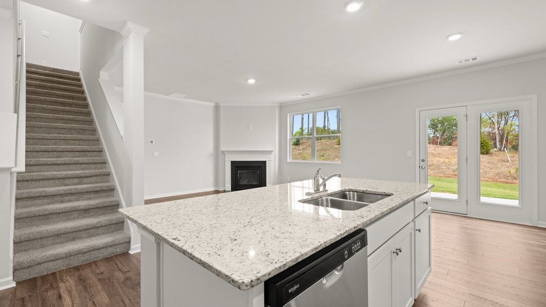 Representative furnished interior of a home built from the Hayden by D.R. Horton in Liberty Crossing, Braselton (Image 8).